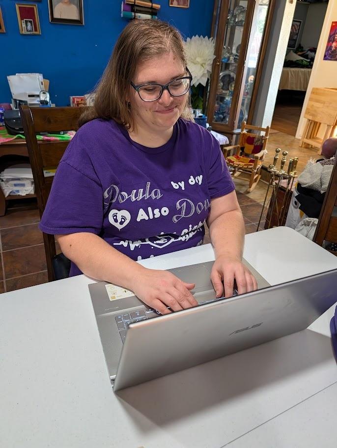 Melanie teaching a virtual class from her home office
